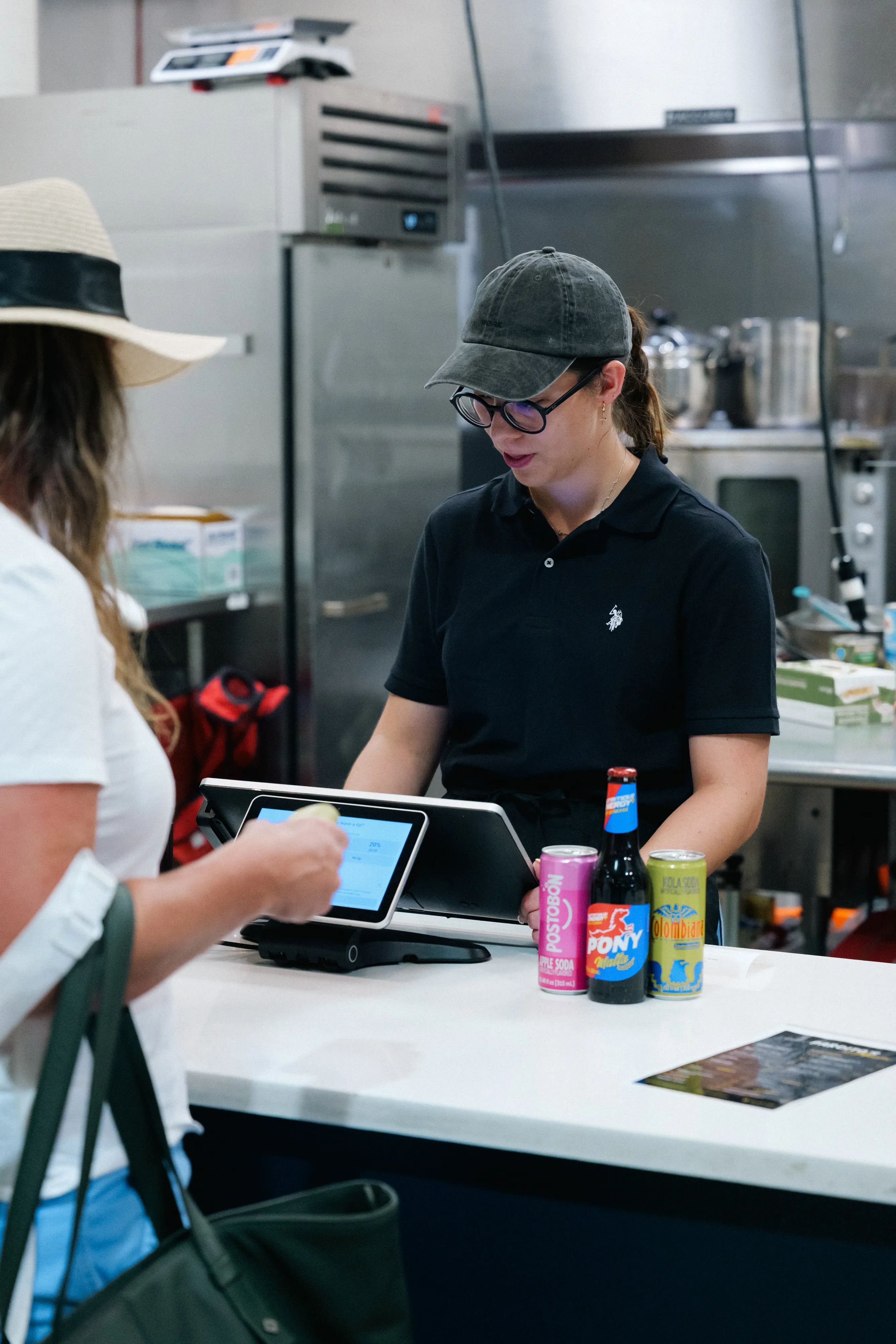 A Pardito's team member taking a customer's order at the pop-up counter